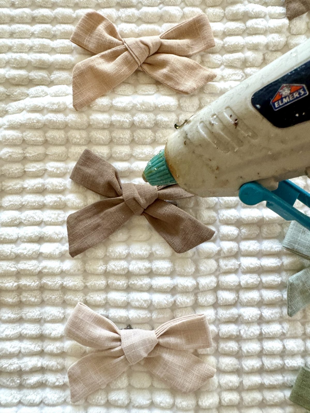 Ways to add bows to your home decor with pillows, art, and more.