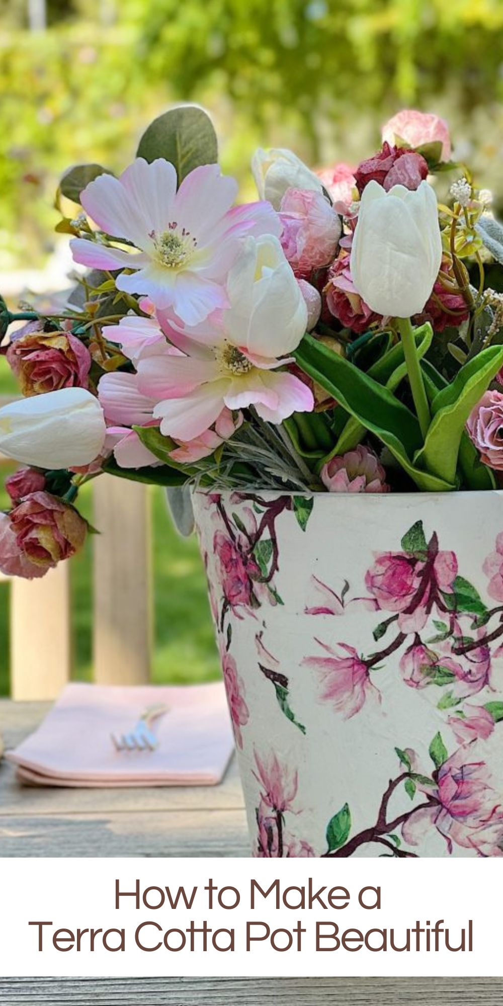 Can you believe I used a paper napkin and a terra cotta pot and came up with this vase? Isn't this just the perfect pot or vase for spring?