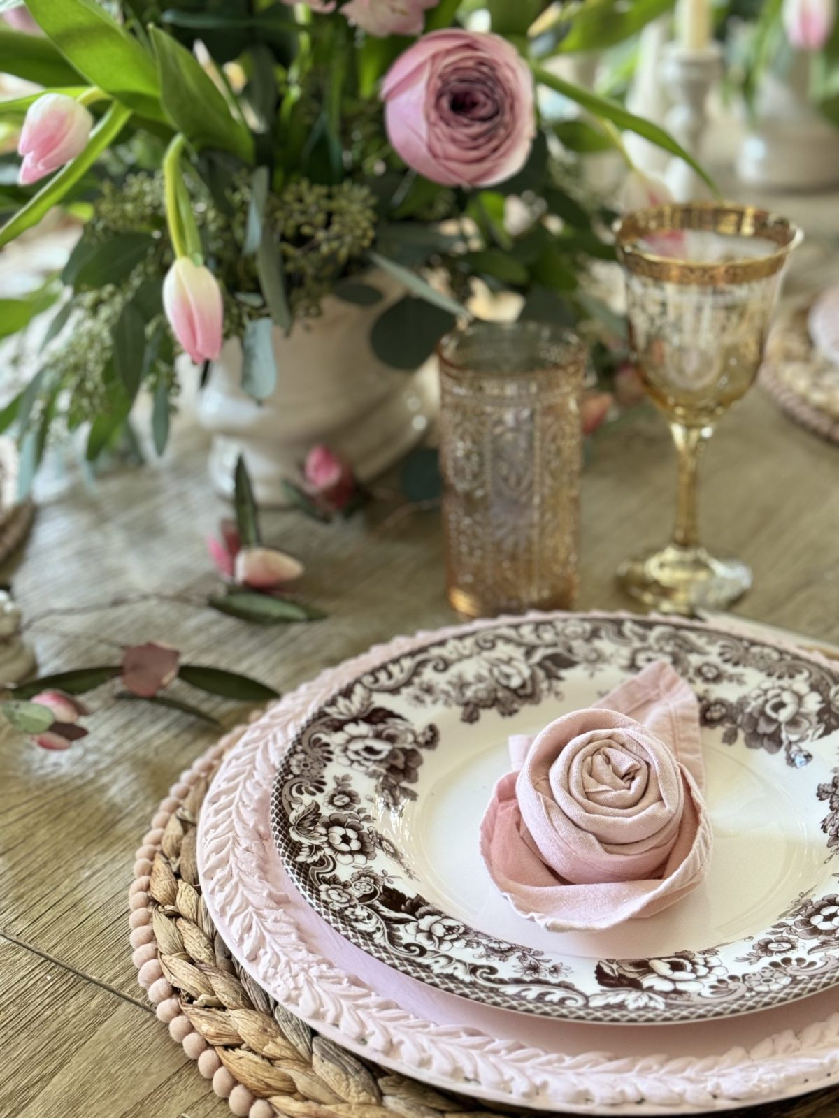 Light pink and tan neutral Valentine's Day Dining Room Table Decor with rosette napkins.