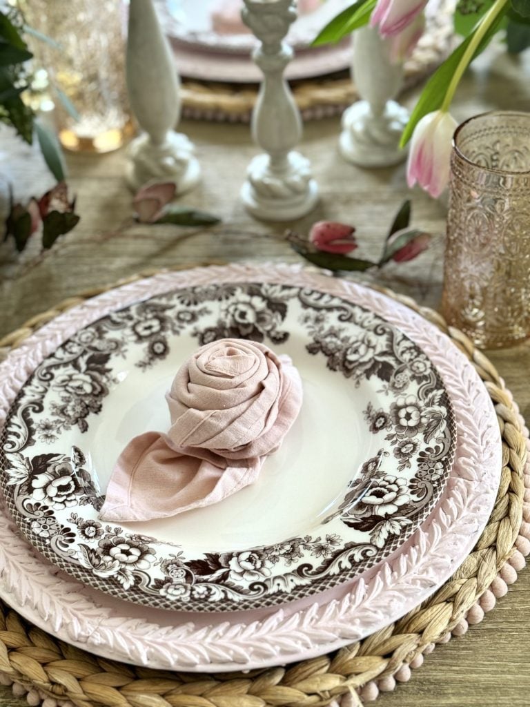 Light pink and tan neutral Valentine's Day Dining Room Table Decor with rosette napkins.