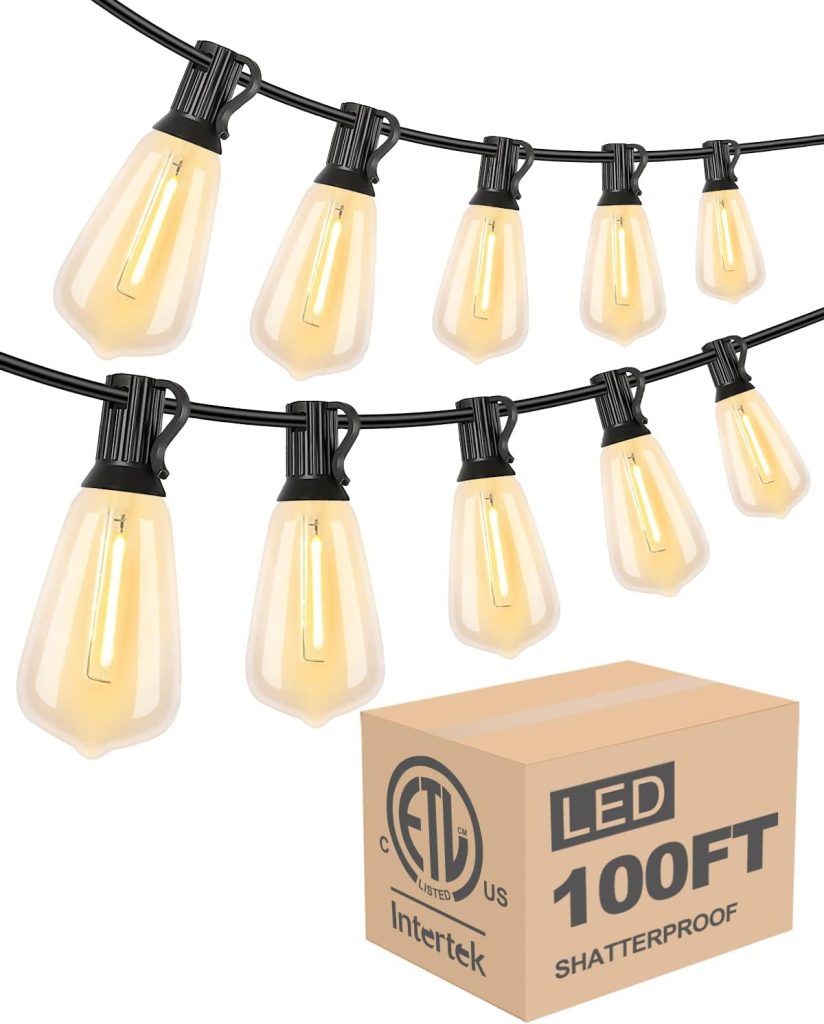 String of led lights with a 100ft label on the packaging indicating length and shatterproof quality, perfect for an outdoor party.