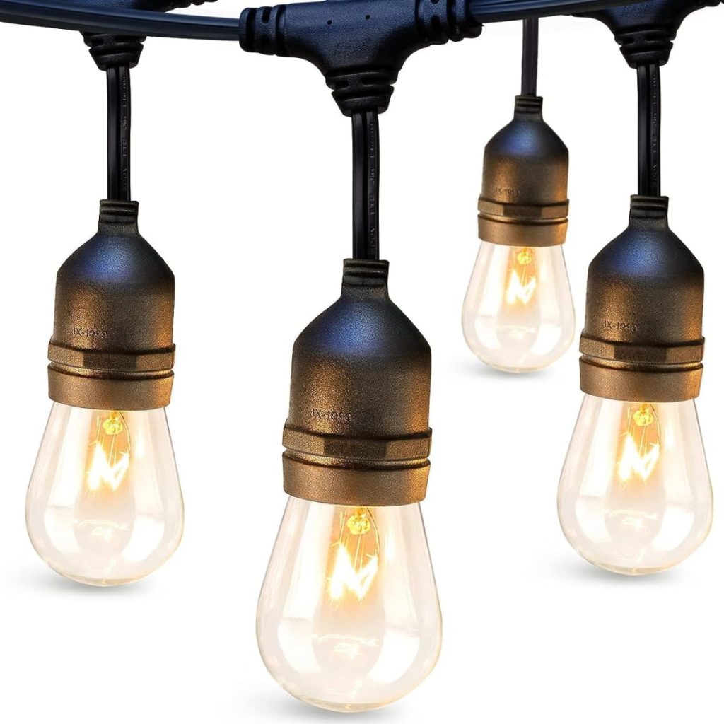 String of illuminated outdoor Edison bulbs against a white background, perfect for an outdoor party ambiance.