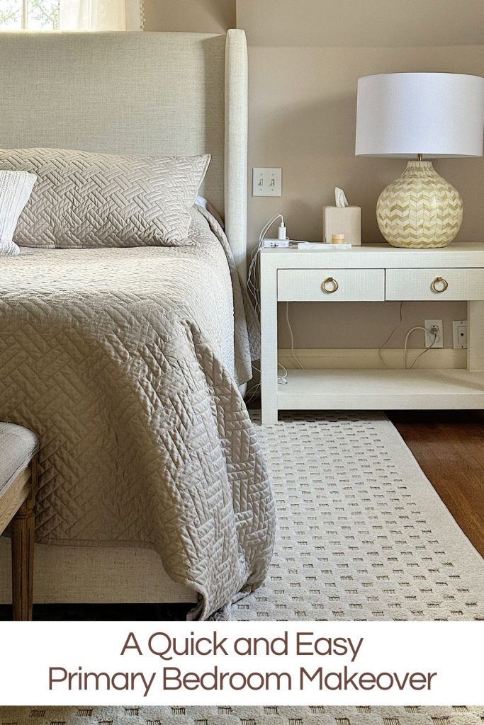Our primary bedroom with neutral colors, a gorgeous rug, and a Serena and Lily nightstand and lamp.