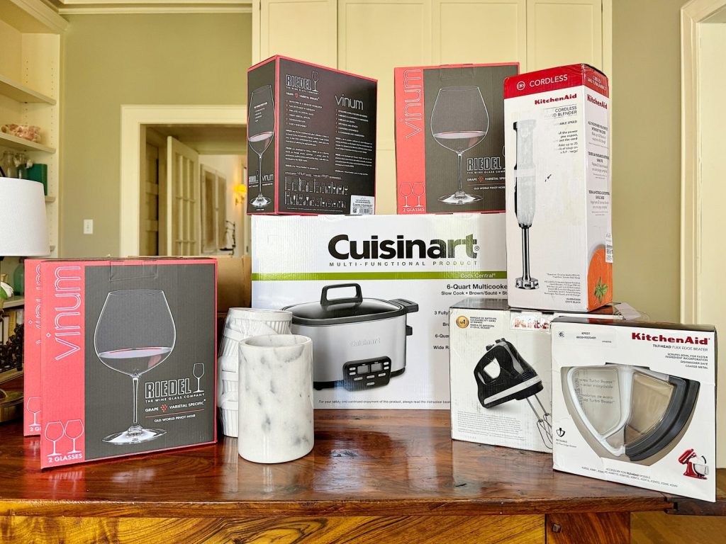 A collection of new kitchen appliances and accessories displayed on a counter.
