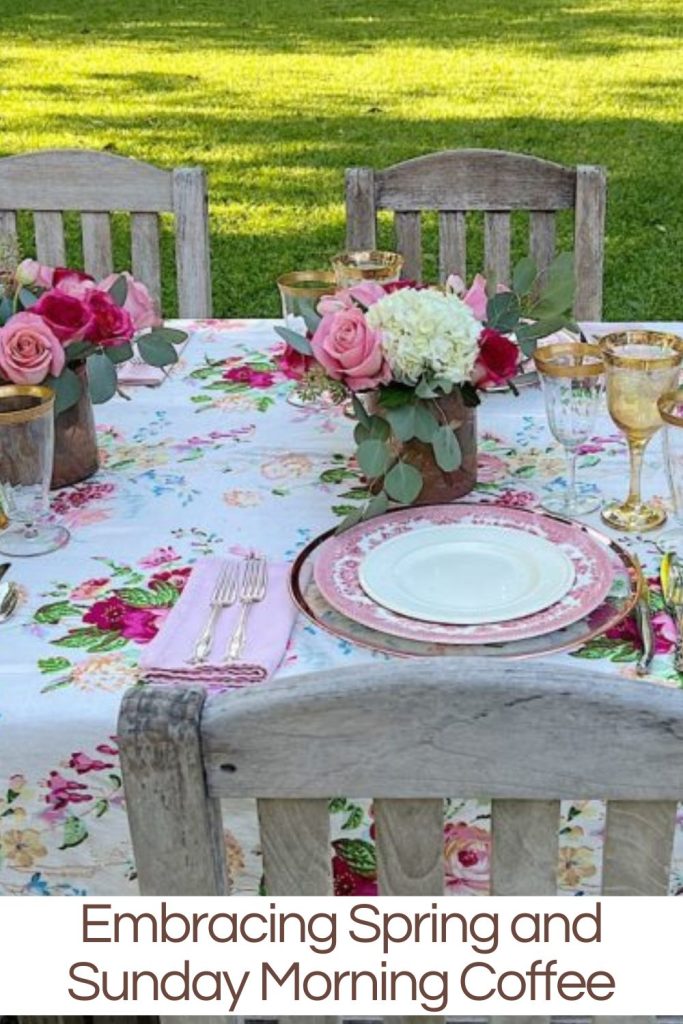 Elegant outdoor table setting with floral decor for a springtime coffee gathering.