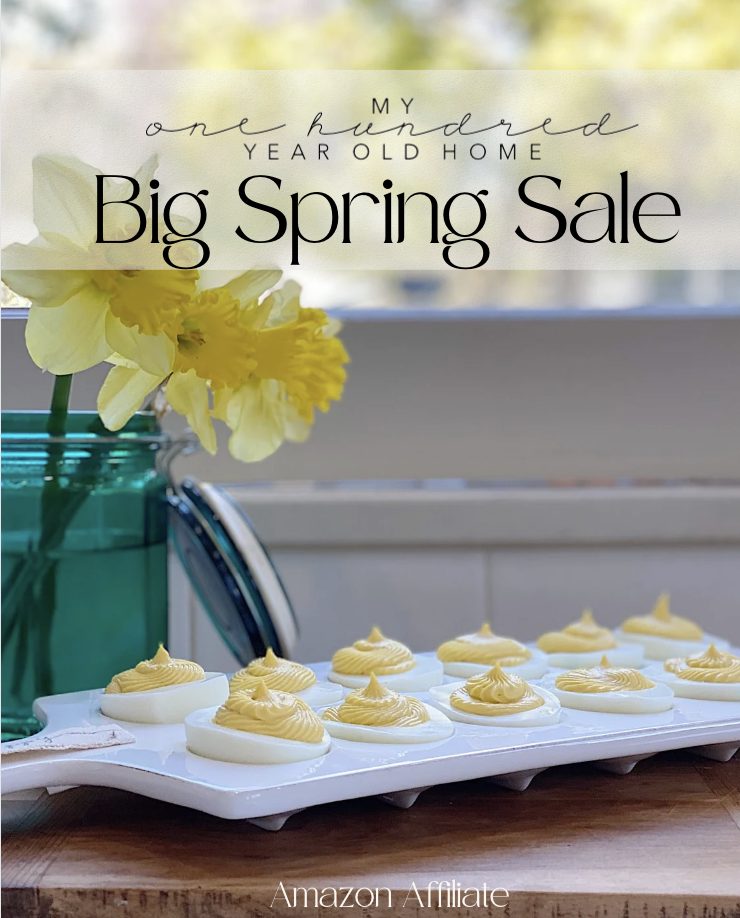 Advertisement for a big spring sale featuring deviled eggs on a white tray set against a homey backdrop.