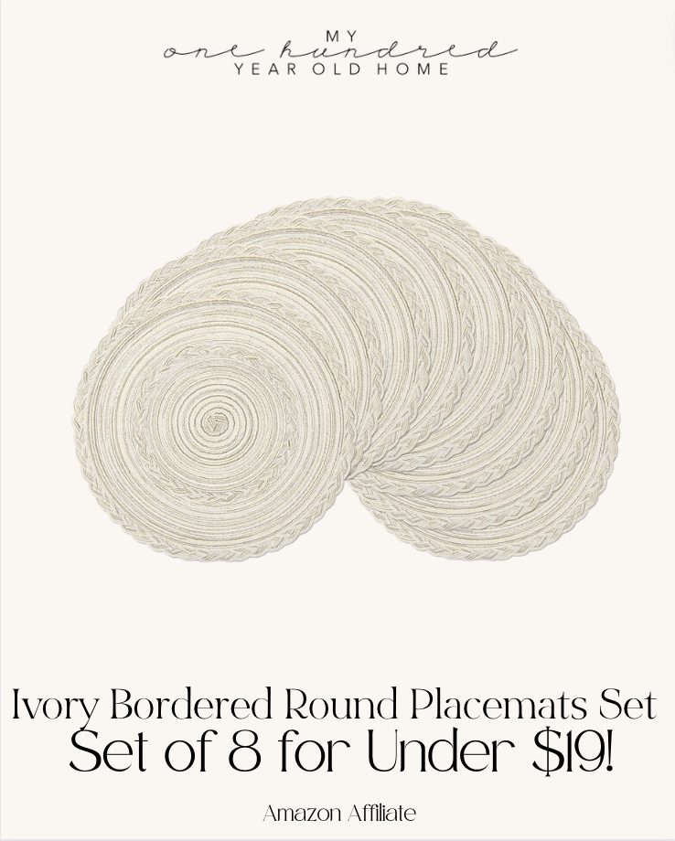 Set of 8 ivory-colored round placemats with a border design, advertised at under $19.