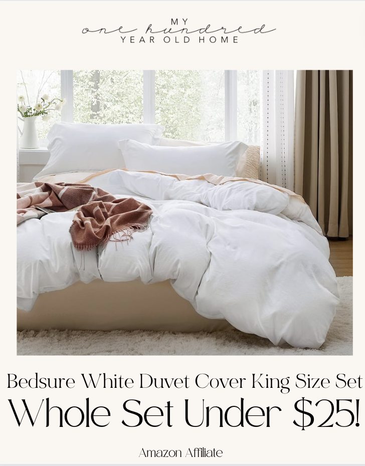A neatly arranged king-size white duvet cover set displayed in a bright room, advertised for under $25.
