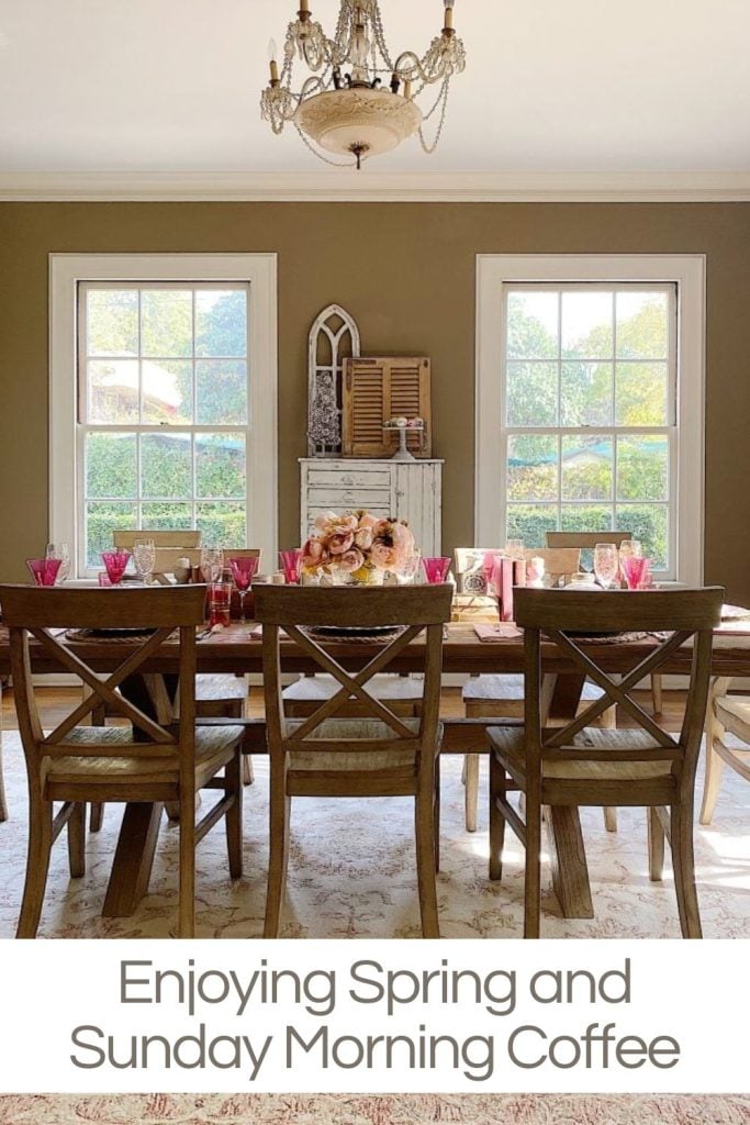 Dining room with a wooden table set for breakfast, large windows letting in natural light, and text overlay "enjoying spring and sunday morning coffee.
