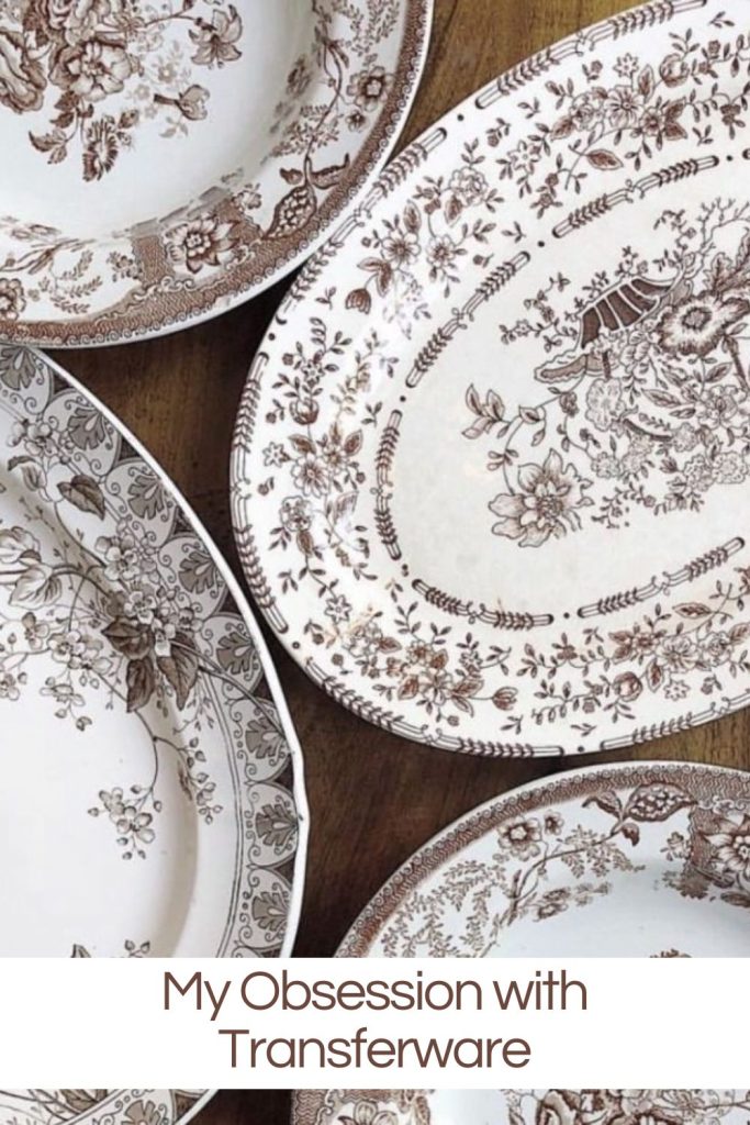 Vintage transferware plates with intricate patterns displayed on a wooden surface.