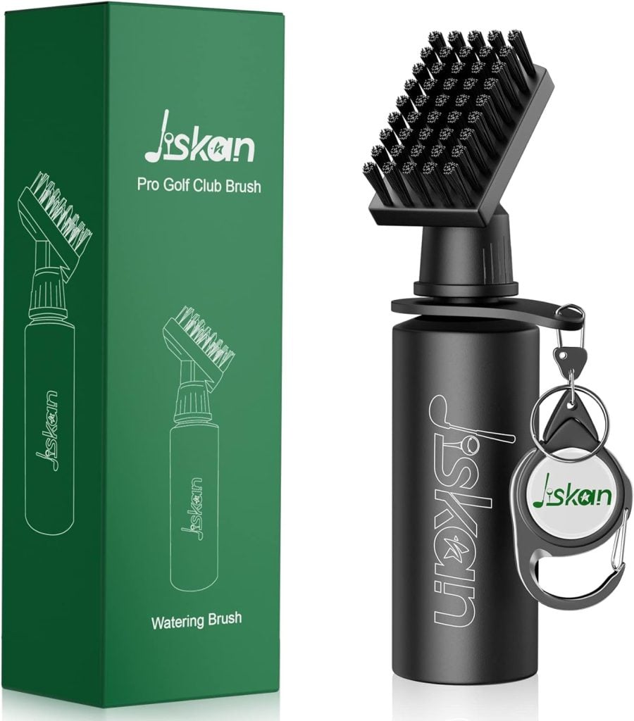 A black golf club cleaning brush with stiff bristles, attached to a spray bottle, is shown next to its green packaging box and a branded keychain—an ideal Amazon Father's Day gift for golf-loving dads.