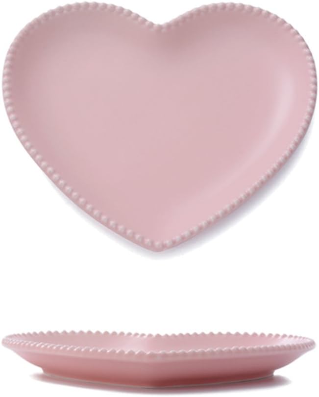 A pink, heart-shaped ceramic plate with a beaded edge, perfect for serving your favorite Mini Tart Recipe, shown from a top view and a side angle.