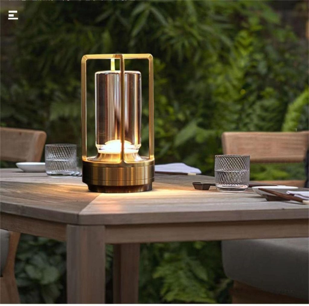A lamp on a table brings a touch of summer beach charm, casting a warm glow reminiscent of sun-soaked days by the shore.