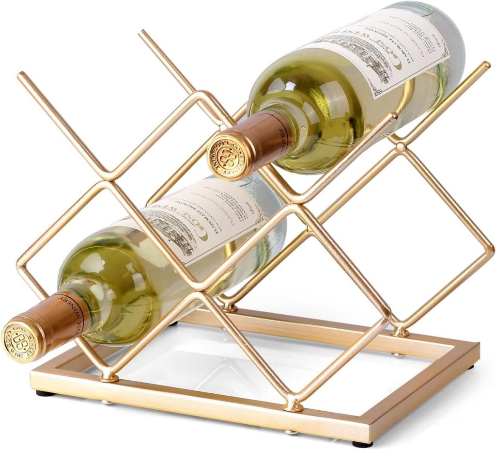 A gold metal wine rack holds two bottles of white wine in a diagonal position, making it a stylish addition to any home wine cellar.