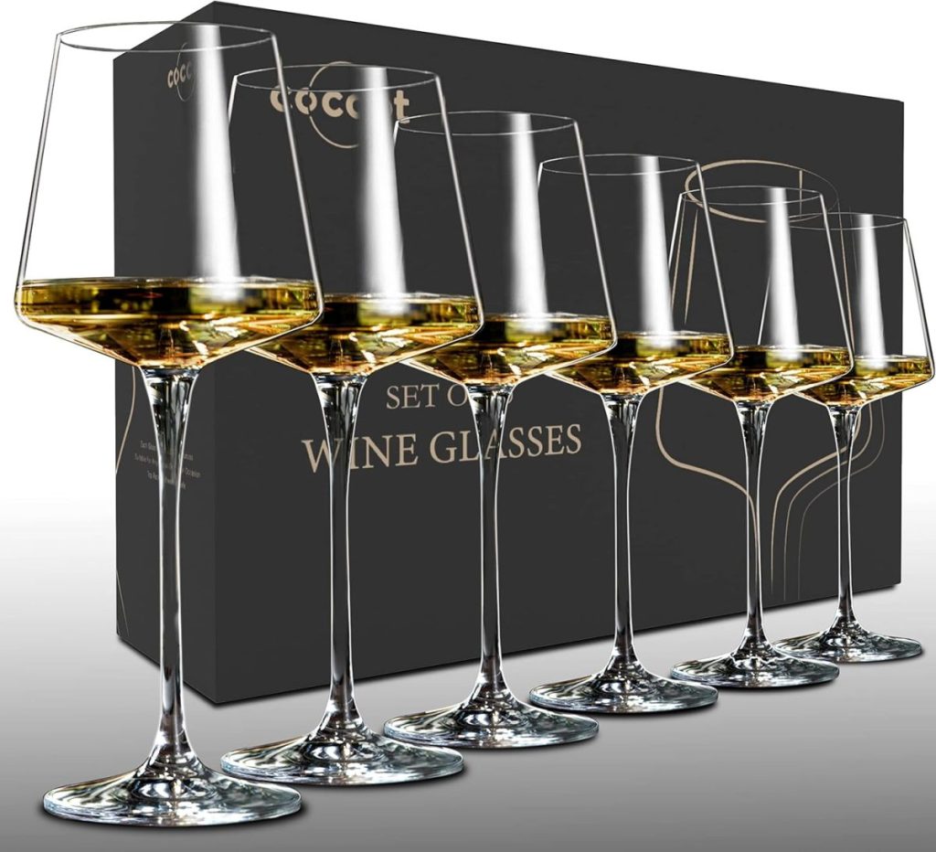 Six modern wine glasses filled with white wine are displayed in front of a black box labeled “Set of Wine Glasses,” perfect for elevating any home wine cellar.