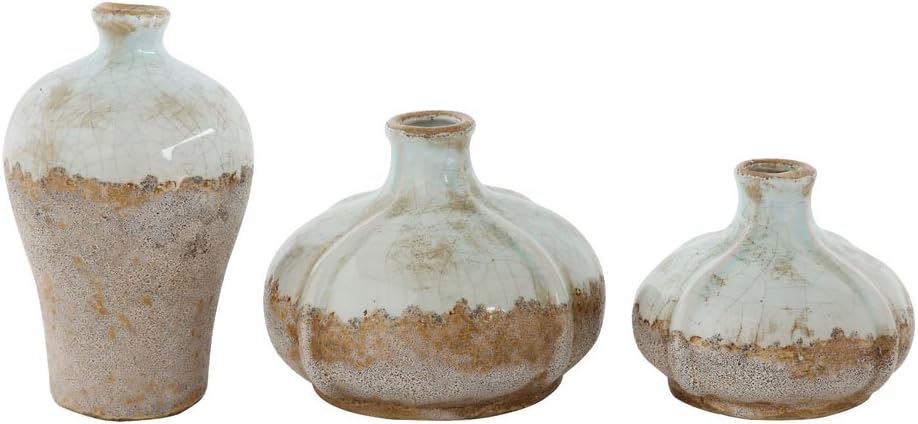 Three ceramic vases with a rustic, crackled white and brown glaze, each uniquely rounded, displayed against a plain background—perfect as a charming house guest gift.