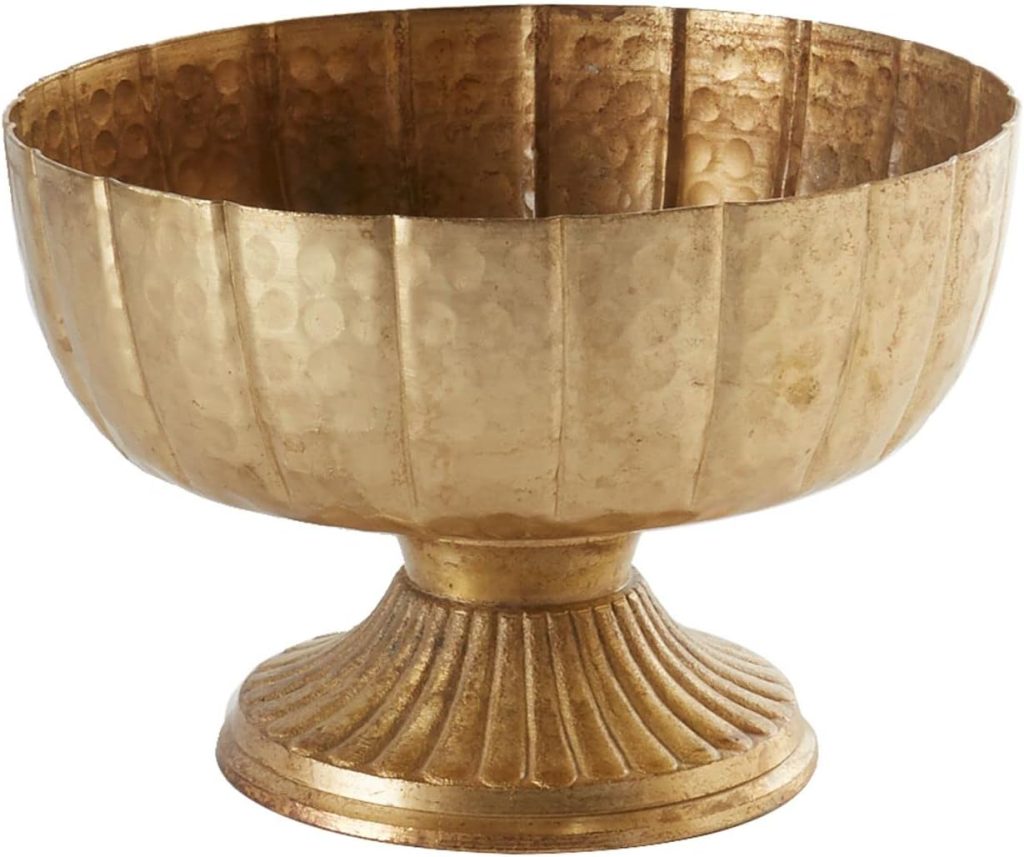 A gold-colored, textured metal bowl with a fluted pedestal base, perfect for adding a touch of elegance to your fall room decor, shown against a white background.