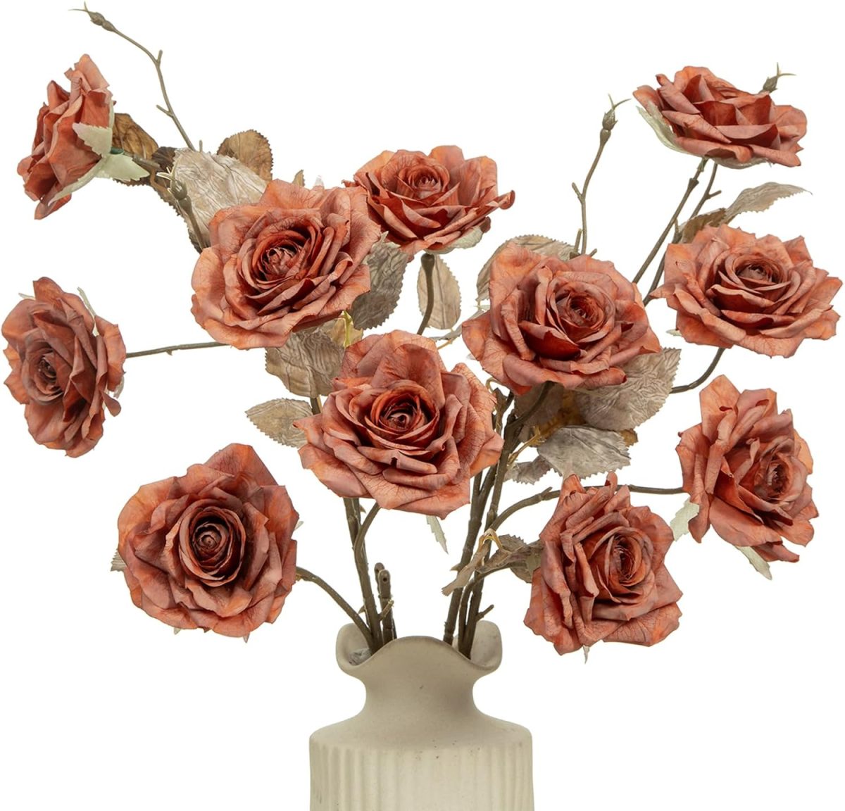 A beige vase holds several branches with artificial brown roses and light-colored leaves, creating a beautiful bouquet perfect for fall home decor.