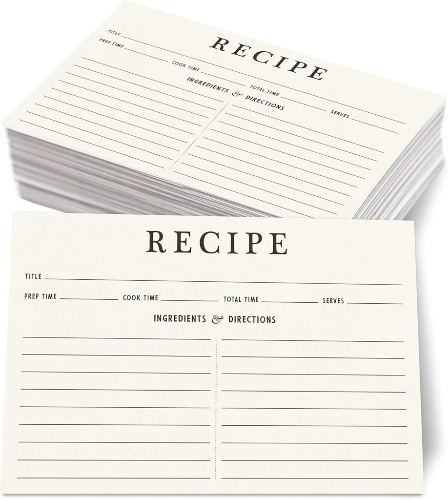 A stack of blank recipe cards with sections for title, prep time, cook time, total time, serves, ingredients, and directions—perfect as a thoughtful house guest gift.