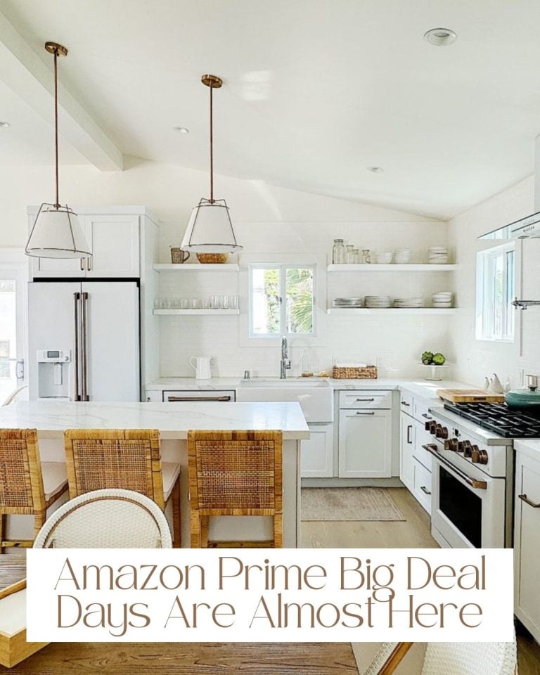 A modern kitchen with white cabinets, open shelving, and stainless steel appliances. Text overlay reads, "Amazon Prime Big Deal Days Are Almost Here.