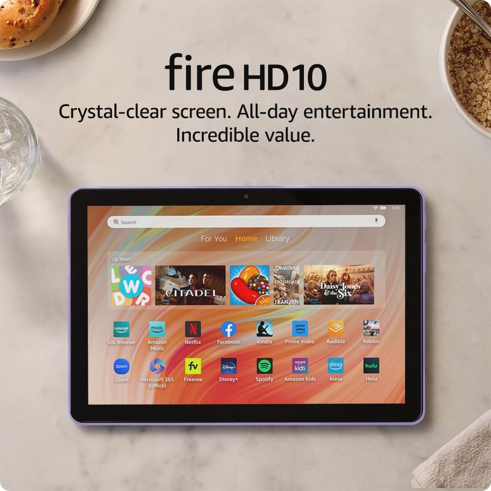 A Fire HD 10 tablet on a table displaying various apps. Text above highlights its clear screen, all-day entertainment, and value.