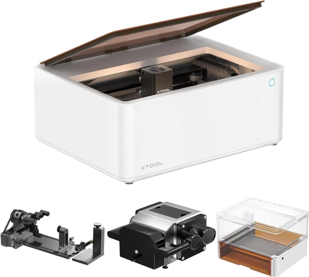 A white XTool laser engraver with a partially open lid is displayed alongside three separate attachments, including plate chargers.