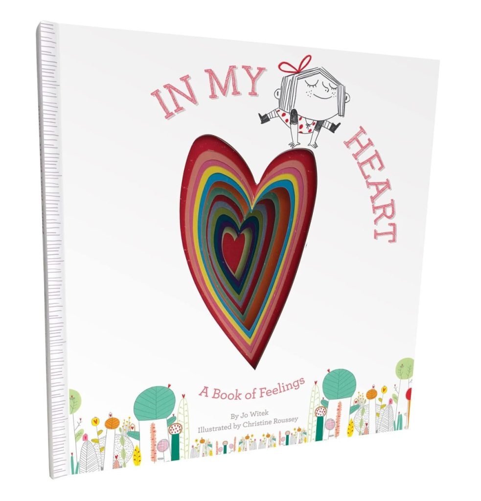 Cover of a children's book titled "In My Heart: A Book of Feelings." It features an illustration of a girl and a large, colorful heart shape. The book is by Jo Witek with illustrations by Christine Roussey.