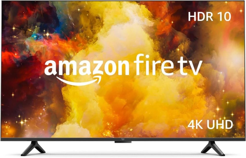 A television screen showing an Amazon Fire TV interface with HDR 10 and 4K UHD features displayed. The background is a colorful, cloudy pattern.