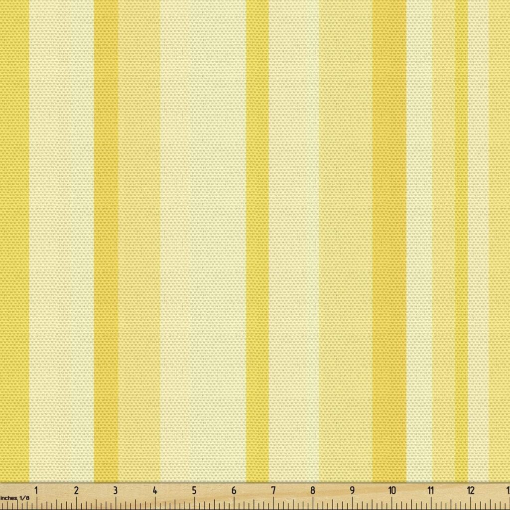 Yellow and cream vertical striped fabric with a subtle texture, perfect for fall pumpkins décor, shown with a measurement ruler along the bottom edge marked in inches 0 to 13.