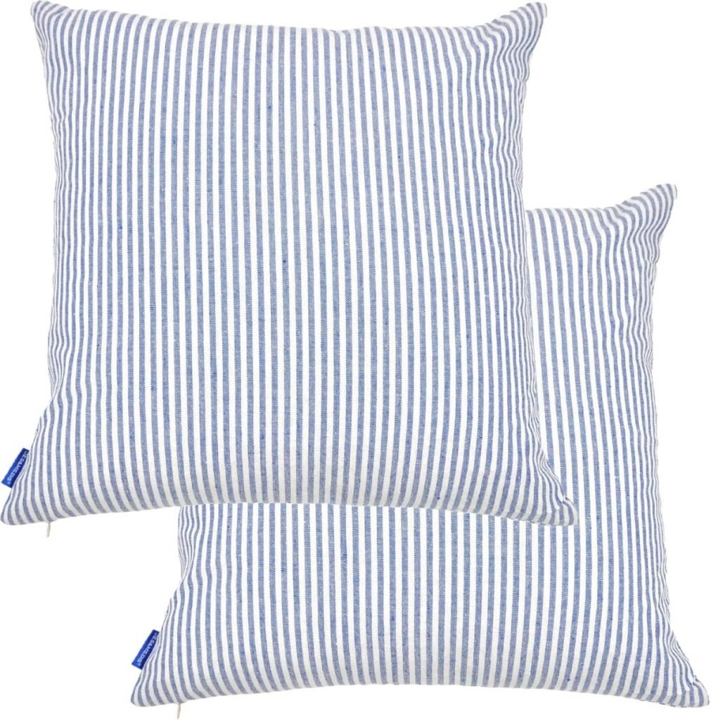 Two square pillows with blue and white vertical stripes.