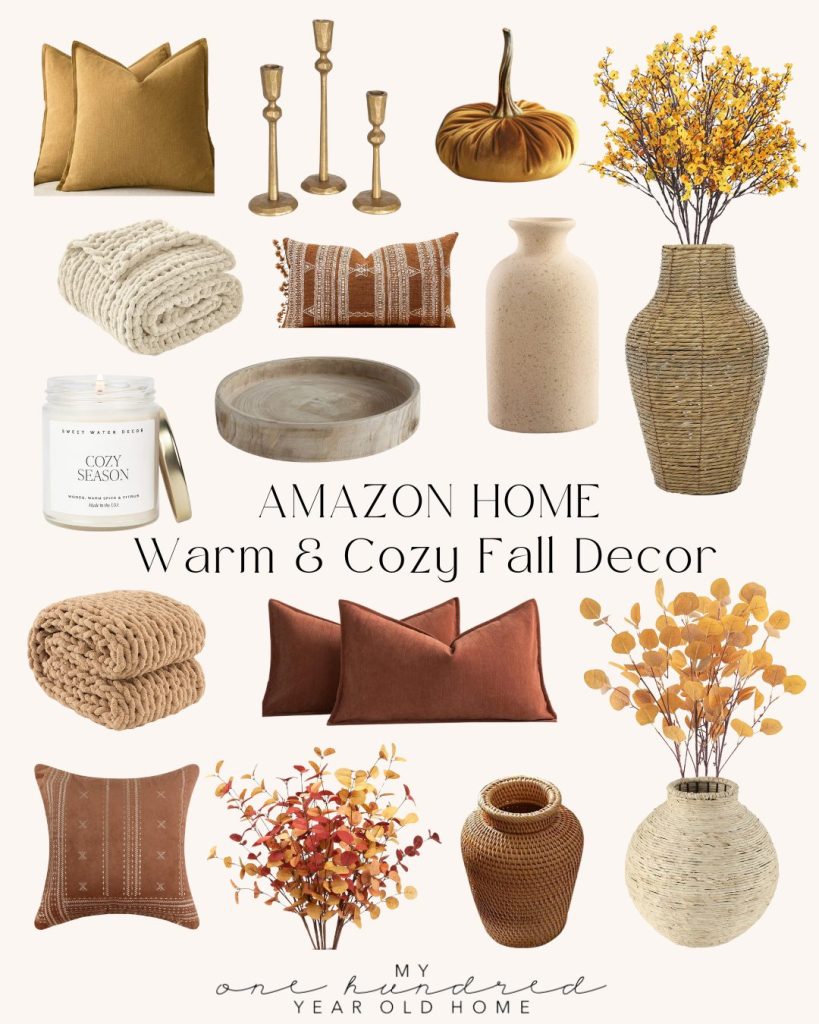 Collection of fall-themed home decor items including pillows, vases, candles, blankets, and decorative accents in warm earthy tones with charming fall pumpkin motifs displayed on a cream background. Text reads "Amazon Home Warm & Cozy Fall Decor".