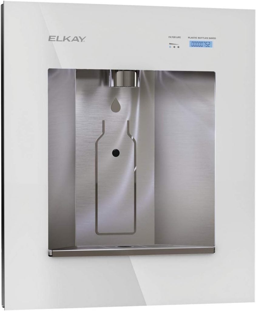 Wall-mounted water bottle filling station with drop icon and digital display, silver and white in color.