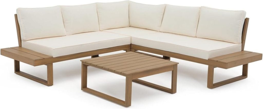 A wooden L-shaped sofa with white cushions and integrated side tables, accompanied by a matching square coffee table.