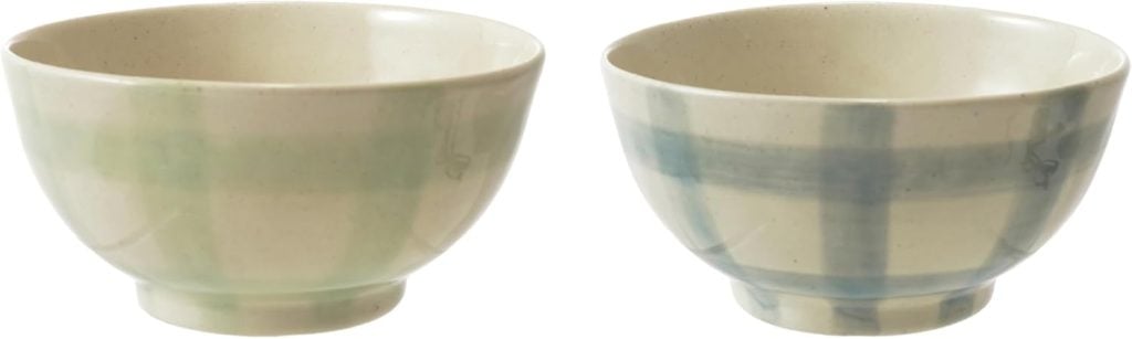 Two ceramic bowls with pale plaid patterns—one with green stripes, the other blue—set against a white background, perfect for serving your favorite fall soup recipes.