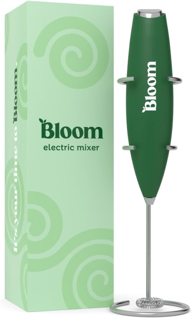 The Green Bloom electric mixer sits elegantly beside its matching box with a swirled design, ready for your next culinary adventure. Available on Amazon Prime for quick and convenient delivery.