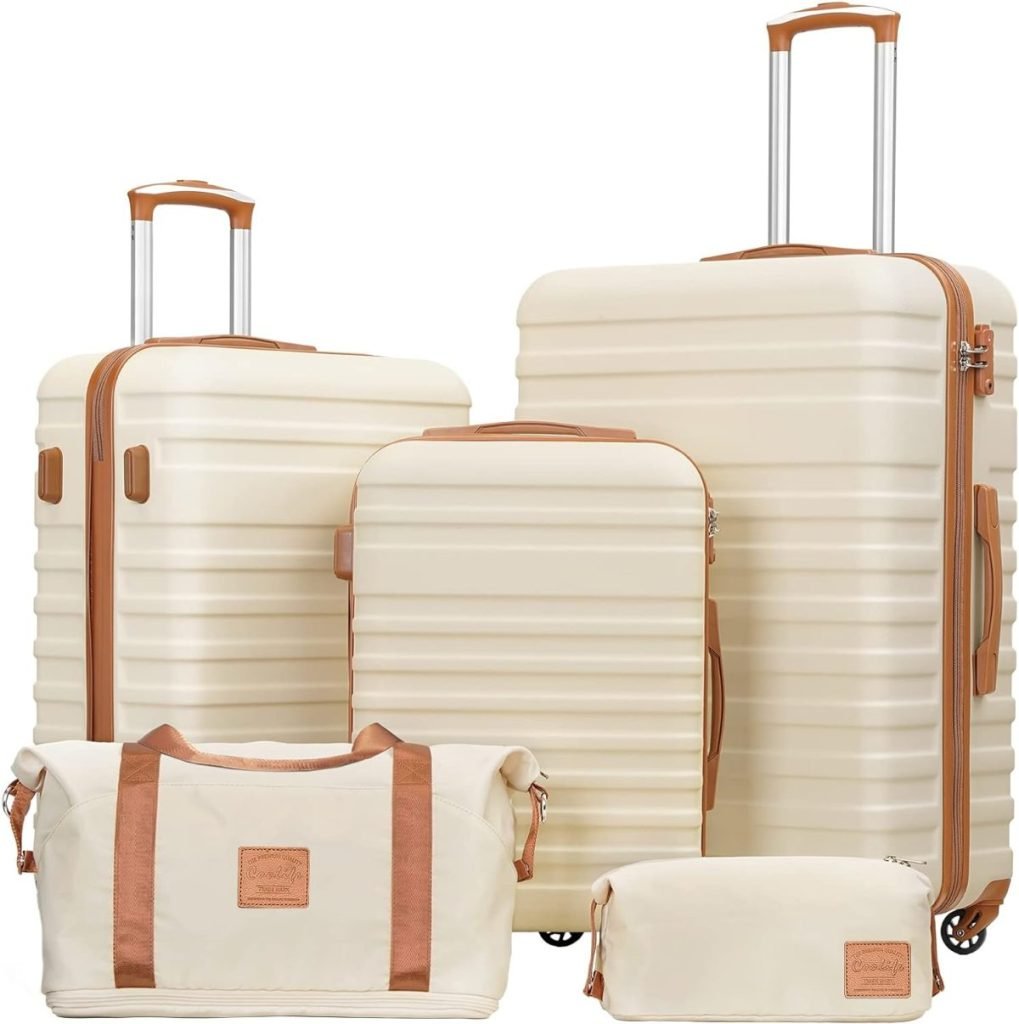 Five cream and tan luggage pieces, including three suitcases with wheels, a duffle bag, and a small pouch, displayed together. Available for those with Amazon Prime for fast and convenient shipping.