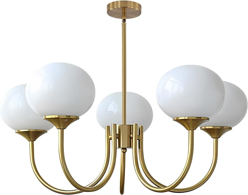 A gold chandelier with five white globe-shaped bulbs on curved arms extending from a central rod.