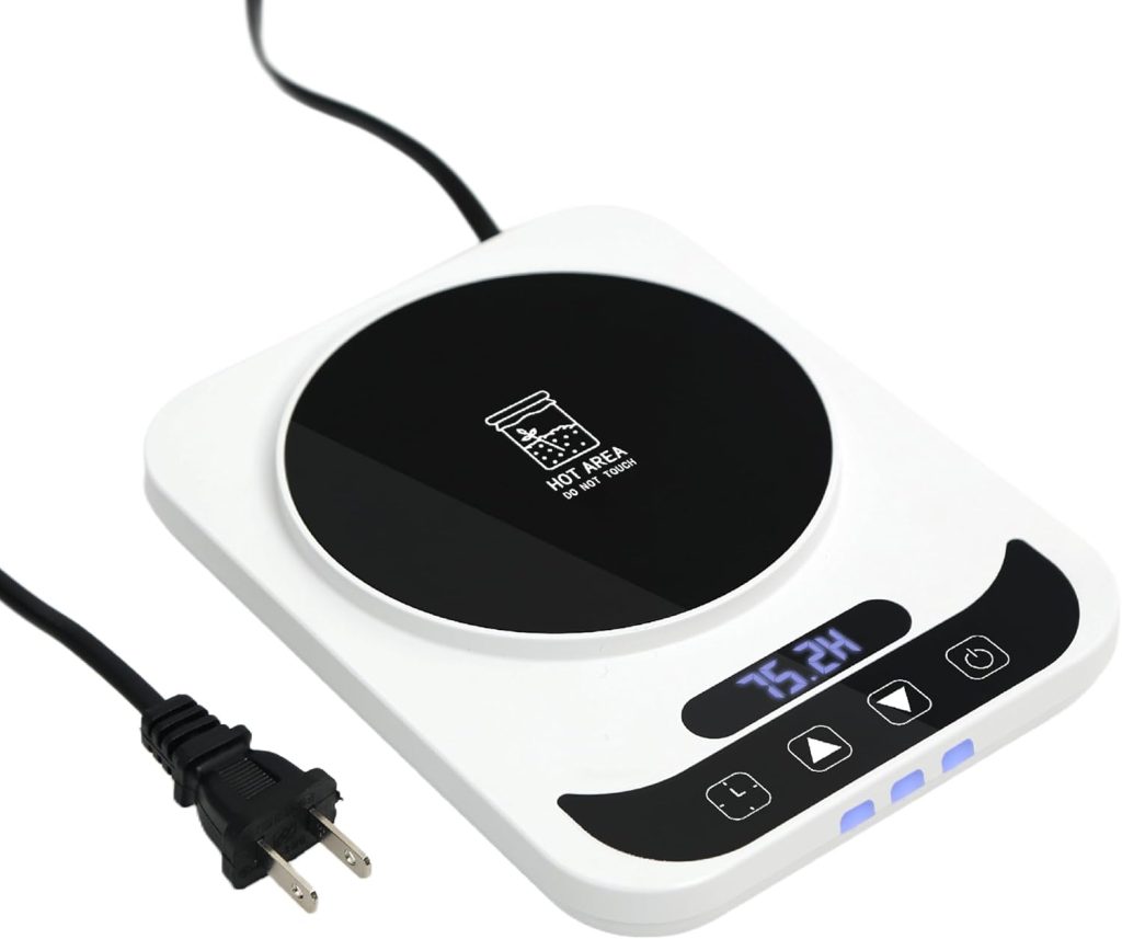 A white electric mug warmer with a black heating surface, digital display showing "75.2 H," control buttons, and a power cord—ideal for keeping drinks warm while you learn how to make a sourdough starter.