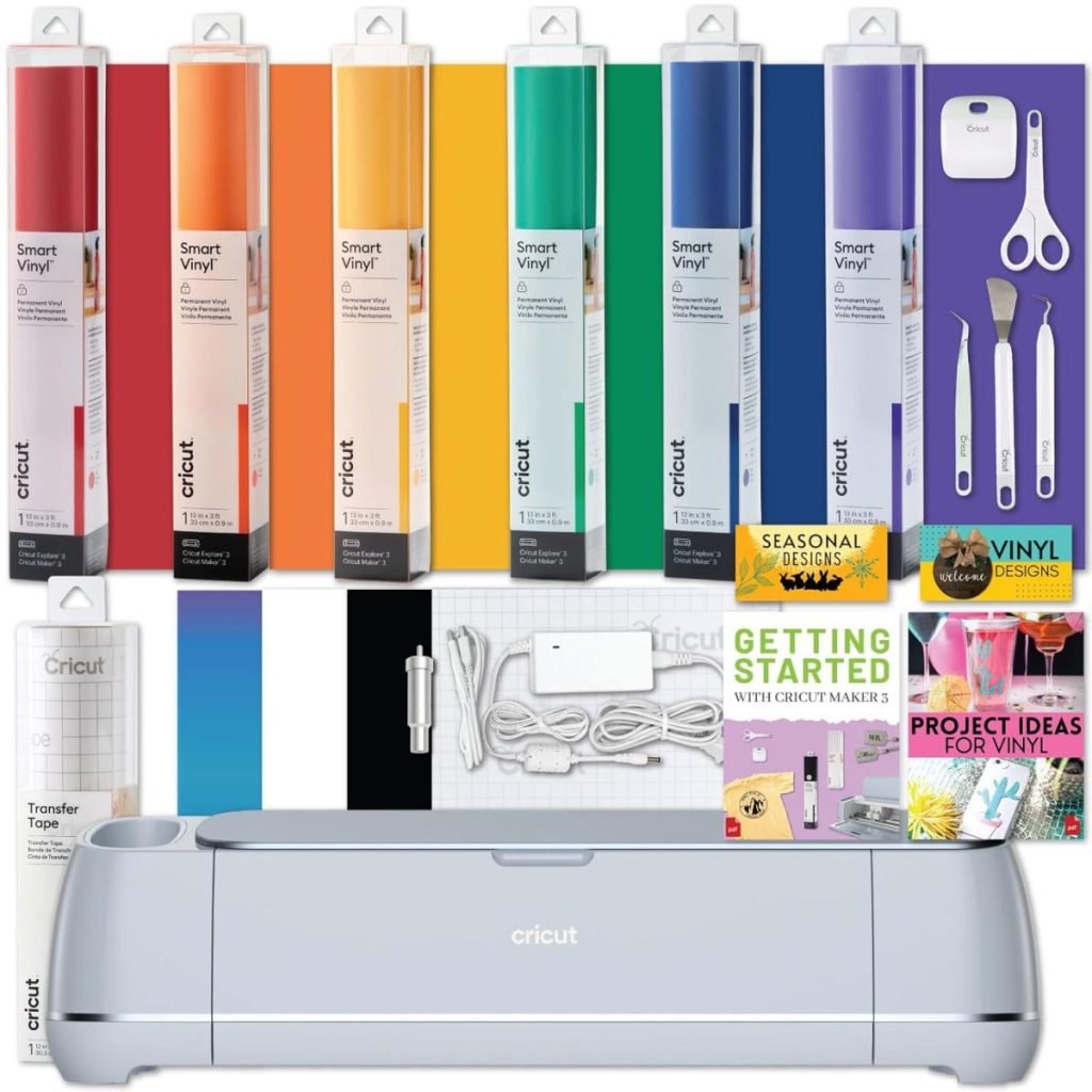 Cricut machine with various colored vinyl rolls, crafting tools, adapter, cutting mat, and instruction booklets displayed—perfect for your next project. Order now on Amazon Prime for fast delivery!