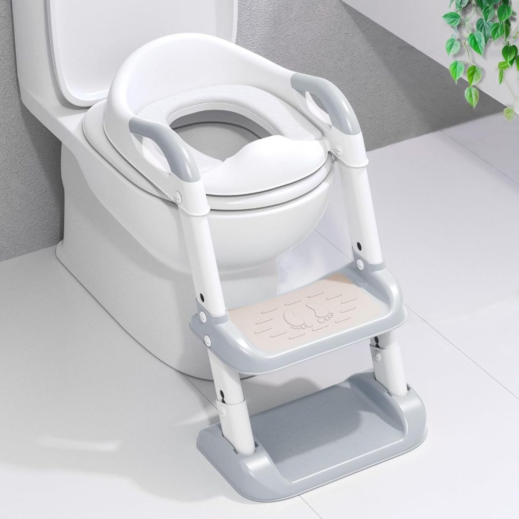 Child potty training seat with safety handles above a toilet, featuring a step stool with a non-slip surface. Available for fast delivery through Amazon Prime.