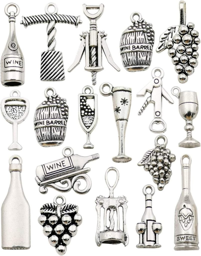 An assortment of wine-themed silver charms, including bottles, barrels, glasses, and grapes.