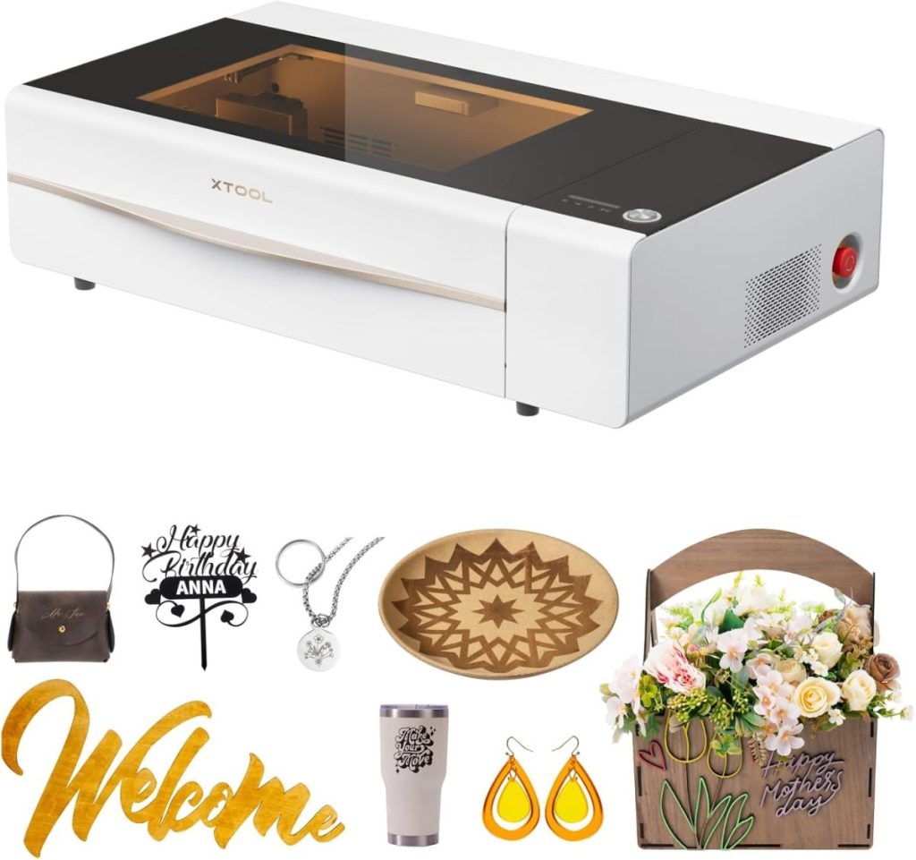 A laser engraver sits amidst examples of its craftsmanship, including a "Welcome" sign, wooden bowl, earrings, cup, purse, and floral box—each a testament to precision. Available with the convenience of Amazon Prime.