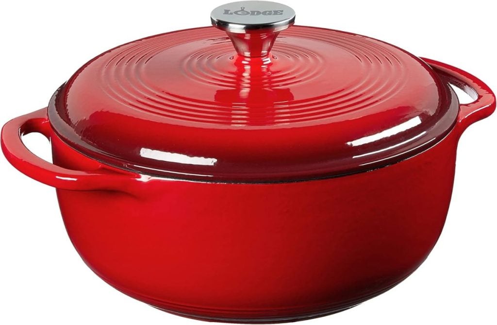 This red round enameled cast iron Dutch oven with lid and handle boasts the "Lodge" brand on its knob and is available for quick delivery through Amazon Prime.