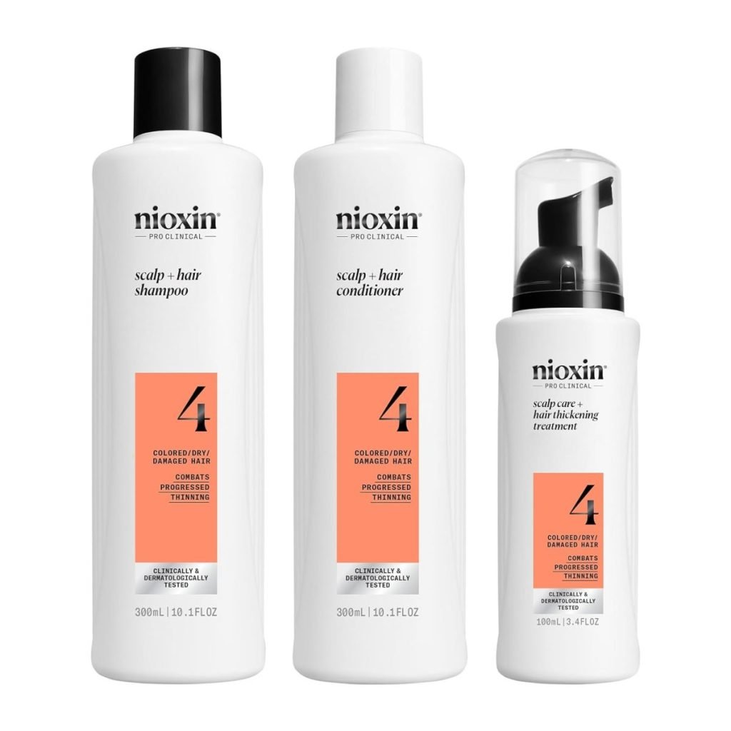 Three Nioxin hair care products: shampoo, conditioner, and thickening treatment, all labeled for colored/treated hair with progressive thinning, marked with a large number 4. Available for quick delivery through Amazon Prime.