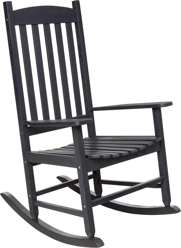 This classic black wooden rocking chair with slatted back and seat features curved rockers and armrests, making it a perfect addition to your Airbnb in Waco.