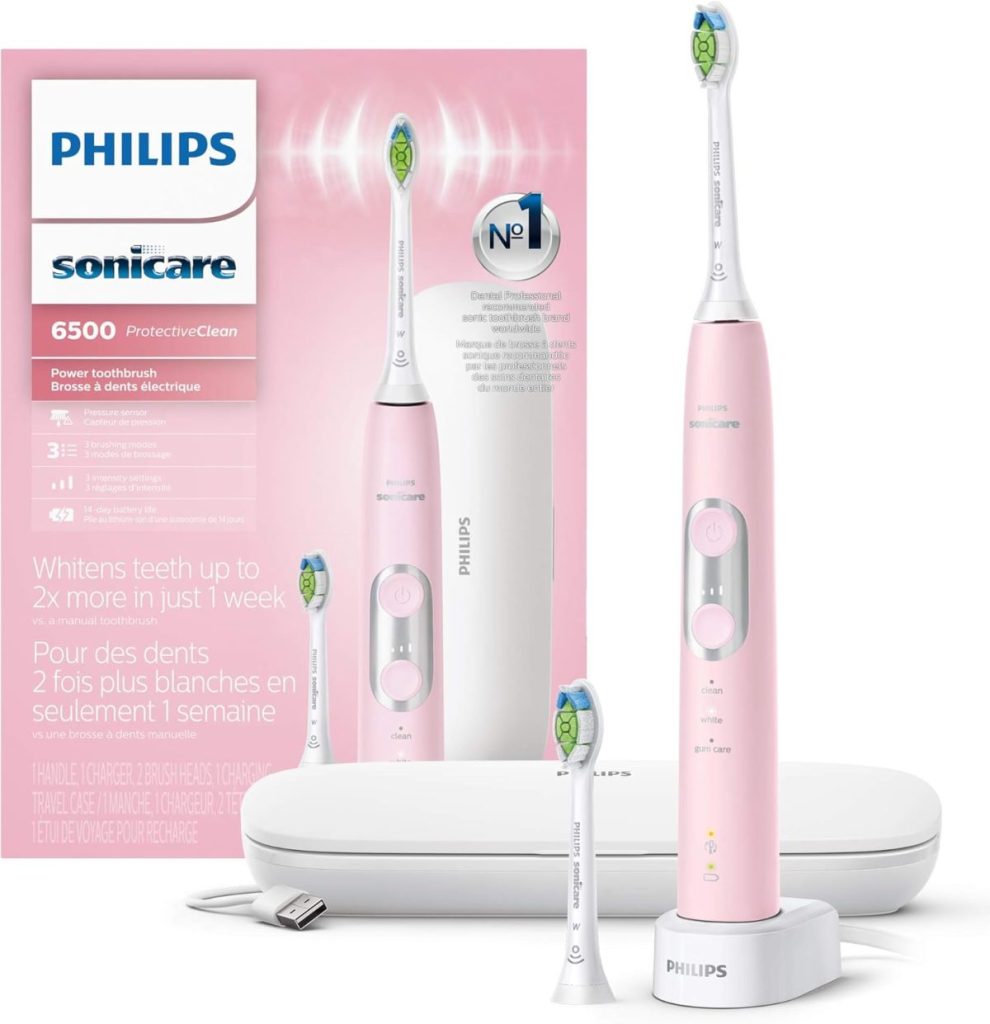 The Philips Sonicare 6500 electric toothbrush in pink comes complete with packaging, charger, travel case, and brush heads. Available with fast shipping for Amazon Prime members, it's the perfect blend of style and convenience for those who prioritize oral hygiene on the go.