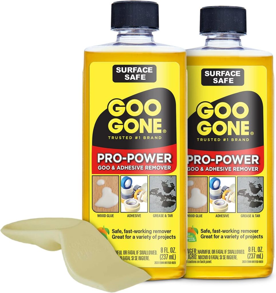 Two bottles of Goo Gone Pro-Power Goo & Adhesive Remover, perfect for cleaning stubborn residue from glass water bottles, come with a handy scraper. The labels depict wood glue, adhesive, grease, and tar. Each bottle holds 8 fl oz (237 mL).