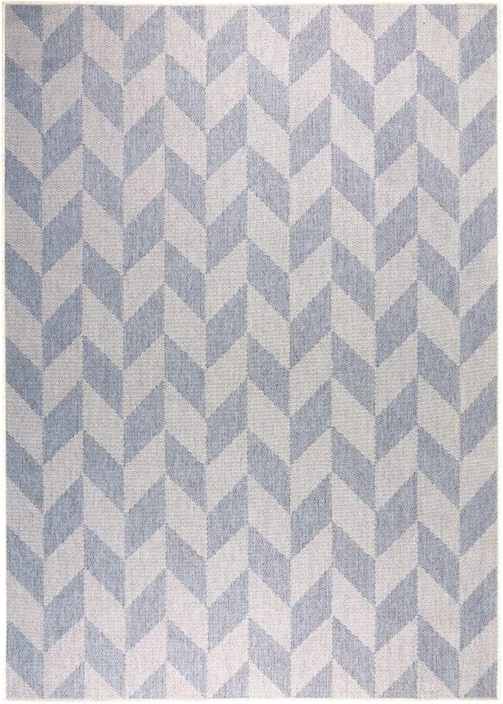 A rectangular rug featuring a light blue and white herringbone pattern.