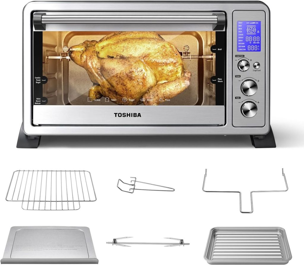 A countertop oven with a roasted chicken inside, available on Amazon Prime. The display shows settings and comes with accessories like racks, trays, and a rotisserie spit.