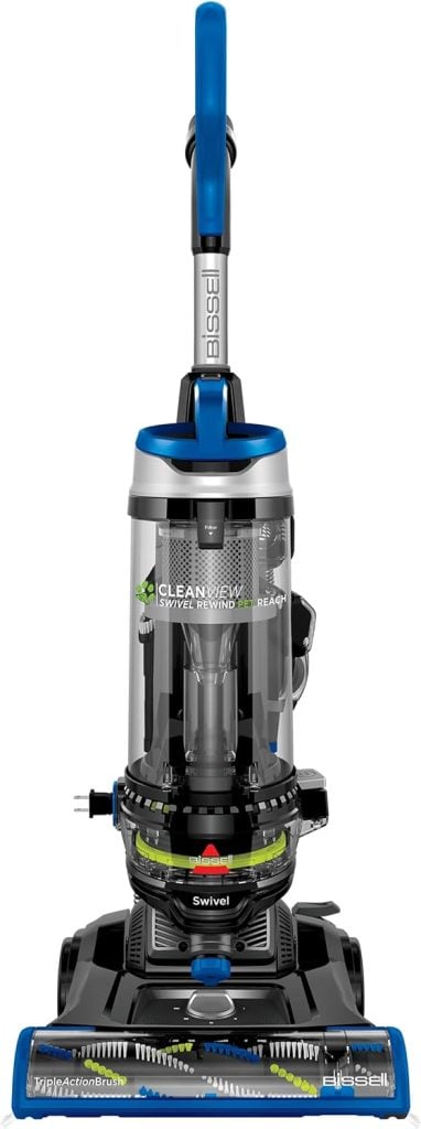 Upright vacuum cleaner with a blue handle, transparent dirt canister, and multi-floor cleaning head.